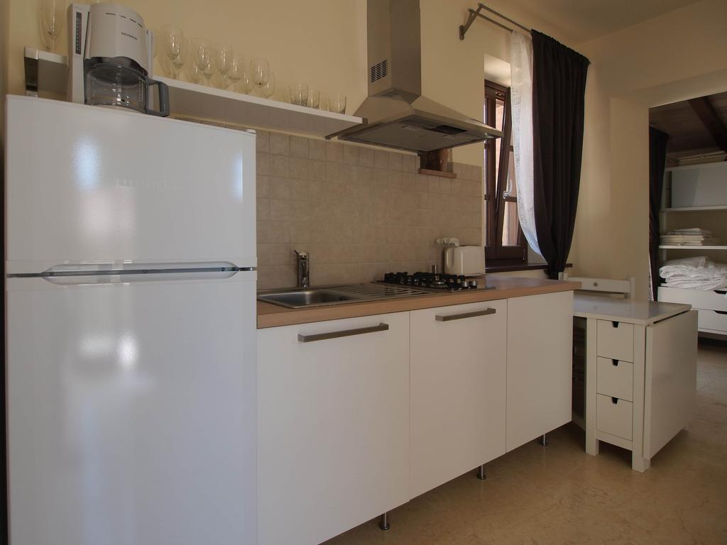 Antico Casale Tiravento Aparthotel Passignano sul Trasimeno Quarto foto
