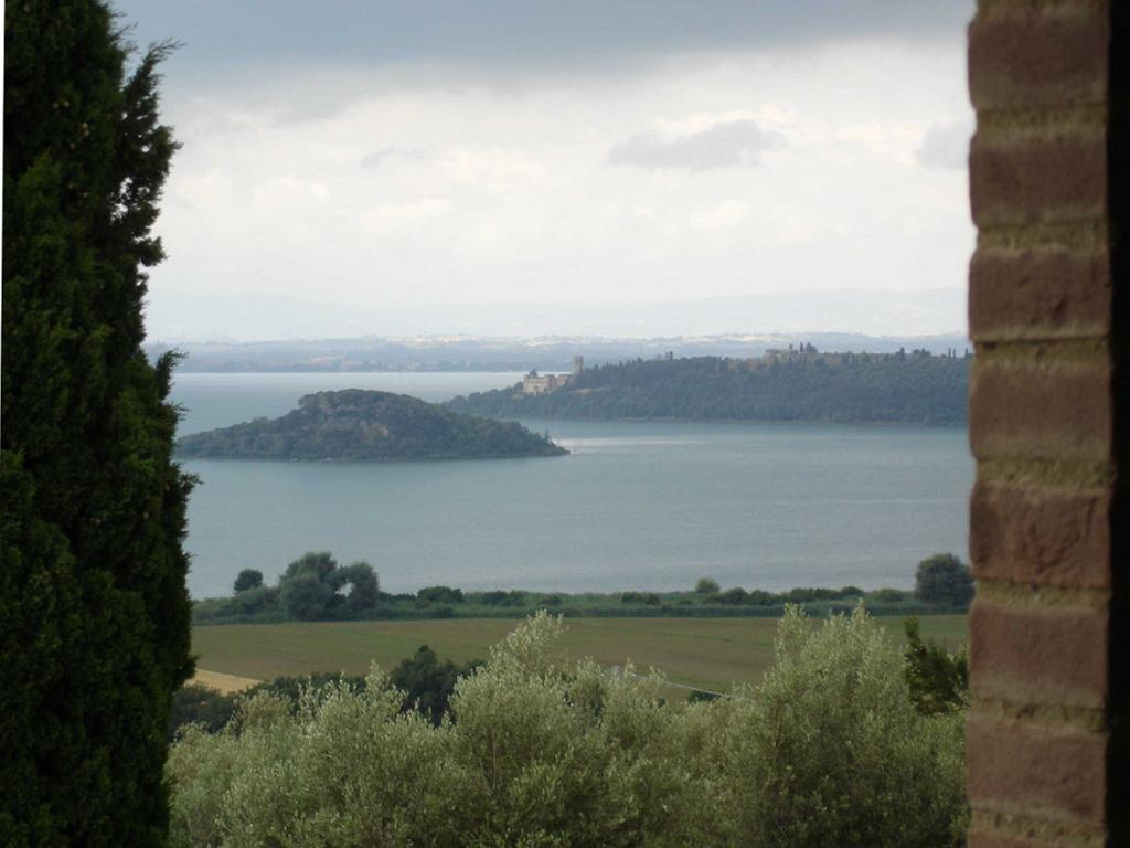 Antico Casale Tiravento Aparthotel Passignano sul Trasimeno Quarto foto